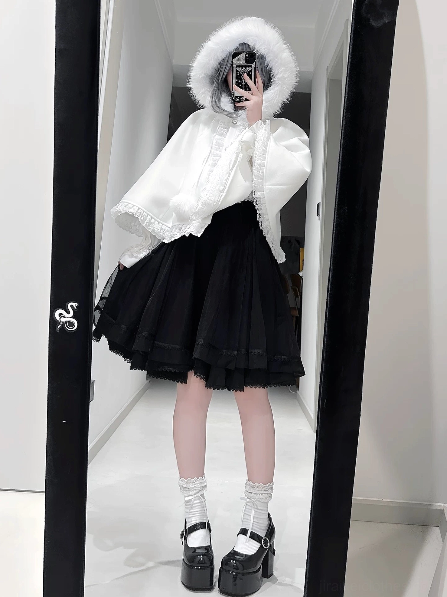 Black and white contrast Jirai Kei outfit featuring black tulle mini skirt, white blouse with collar bow, platform Mary Jane shoes