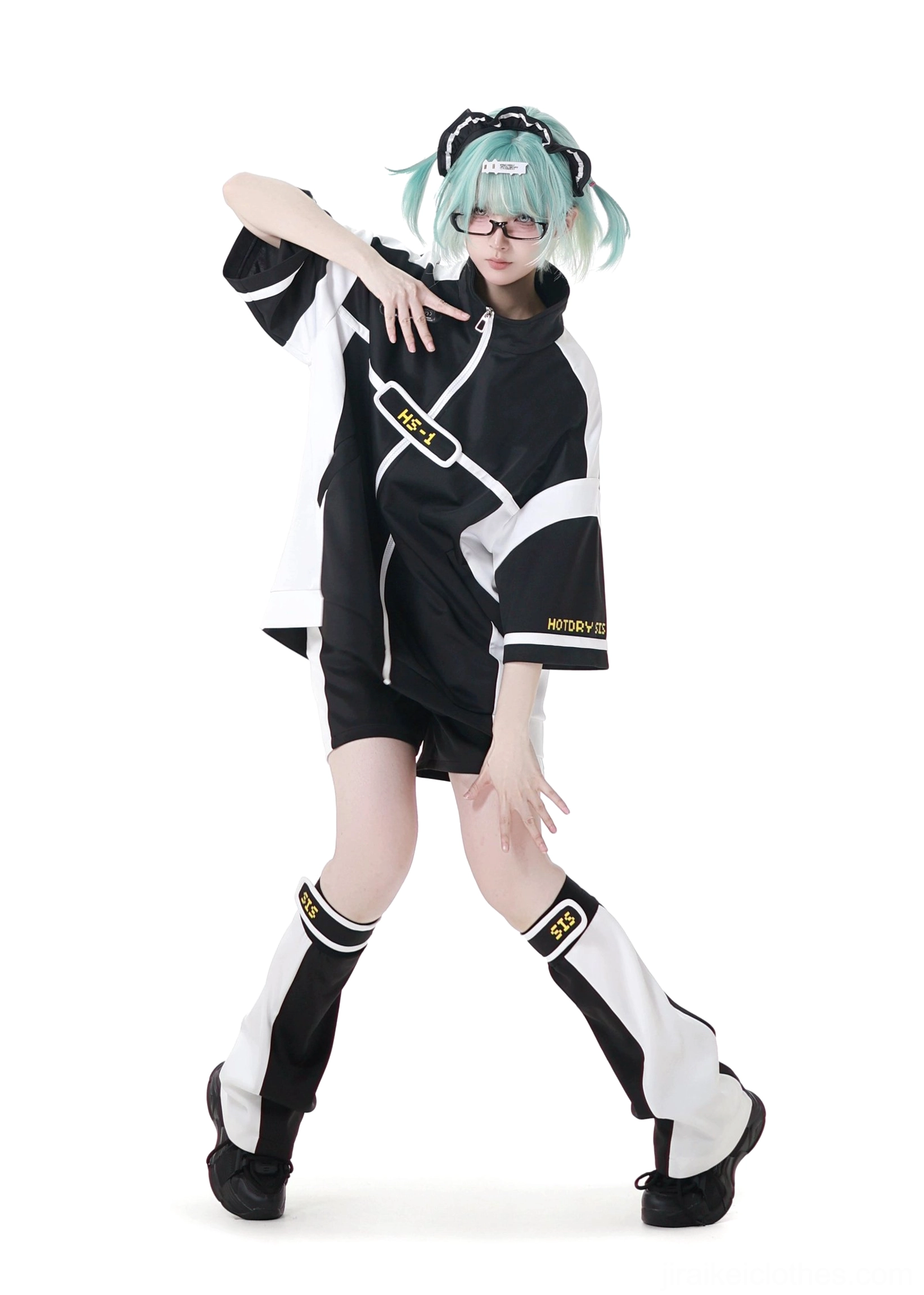 Black and white Jirai Kei sporty outfit dynamic stylized pose color block leg wear studio