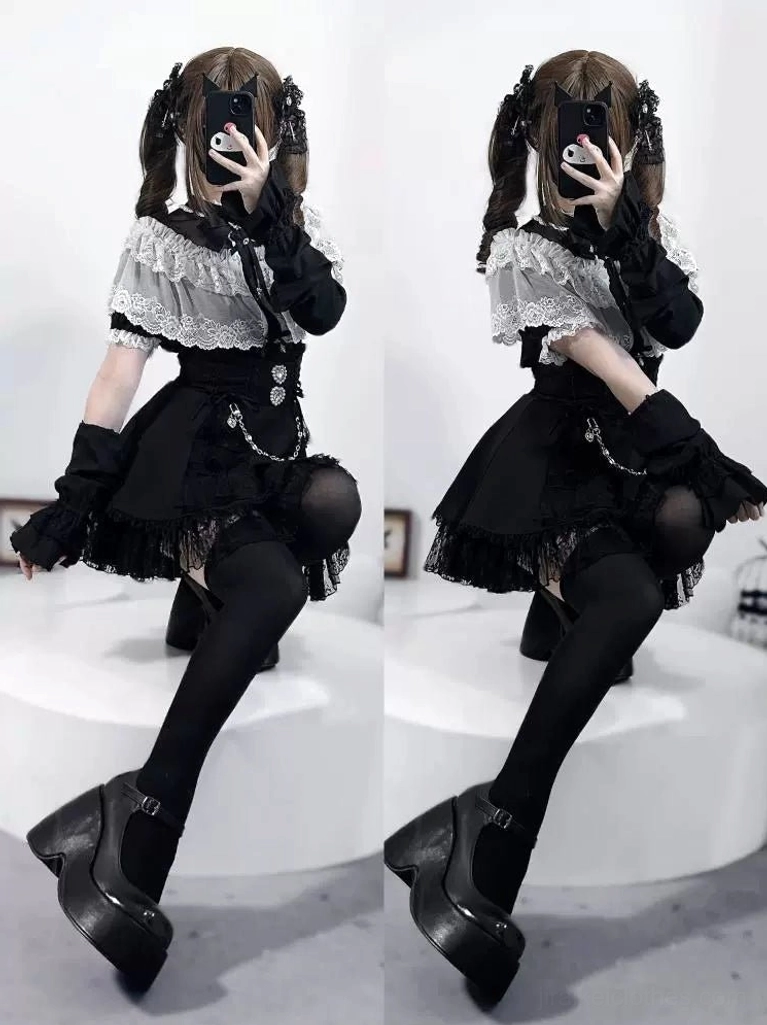 Black Jirai Kei blouse with ruffled lace and layered cape worn with thigh-high socks and platform boots in seated mirror view
