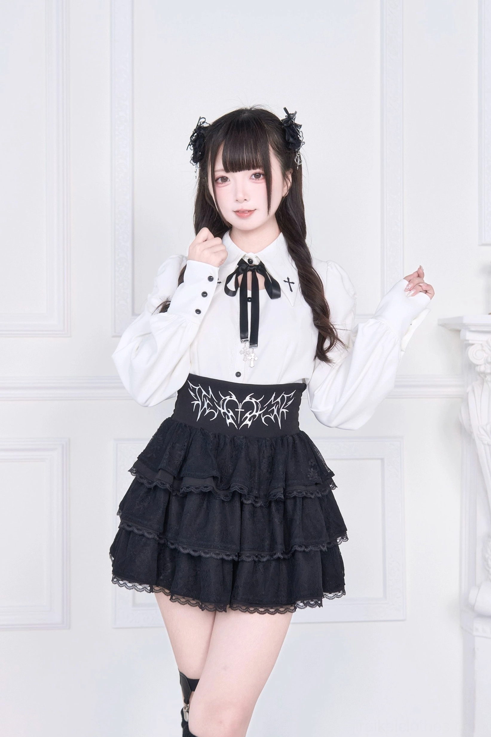 Jirai Kei blouse close-up front detail bow neck tie cross embroidery waistband layered black ruffled skirt