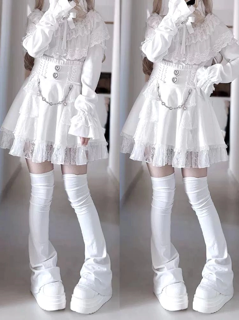 Jirai Kei blouse layered lace cape and bow tie accessory detail shot showing rhinestone buttons and embroidered trim