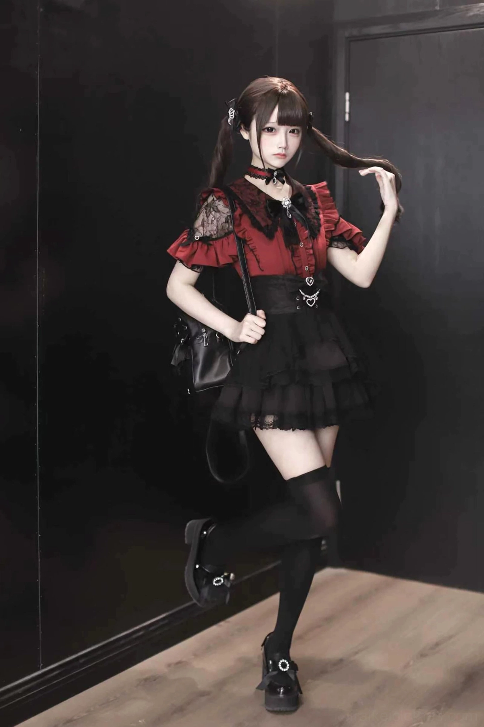 Jirai Kei blouse pintuck construction and multi-layer ruffle architectural design close-up
