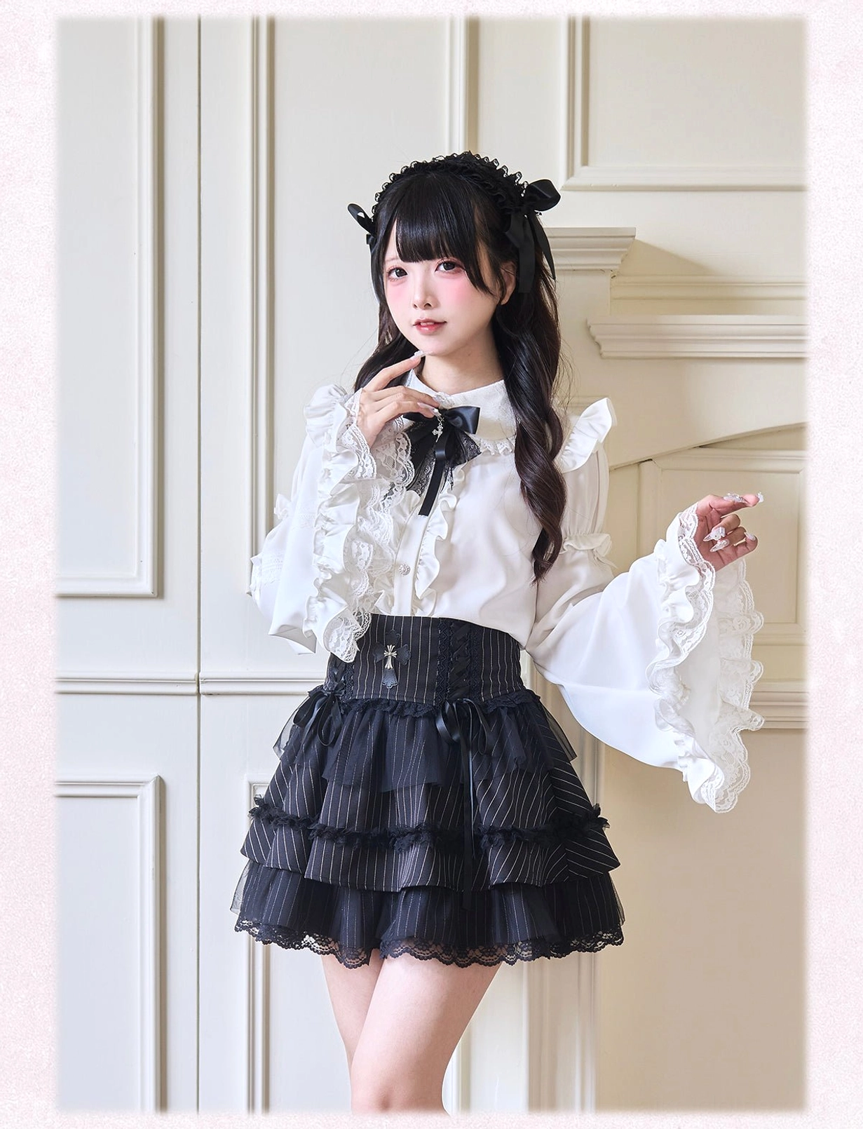 Close-up detail of Jirai Kei blouse featuring elaborate ruffle bell sleeves and structured waistband with intricate lace and frill embellishments