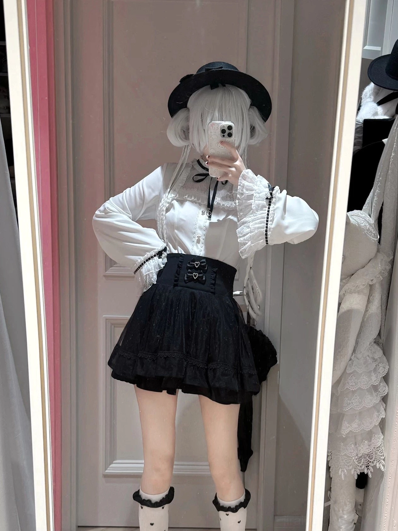 Back view of jirai kei blouse and a-line skirt set showing layered ruffles, lace cuffs detail, and structural construction of the double-layer chiffon ensemble