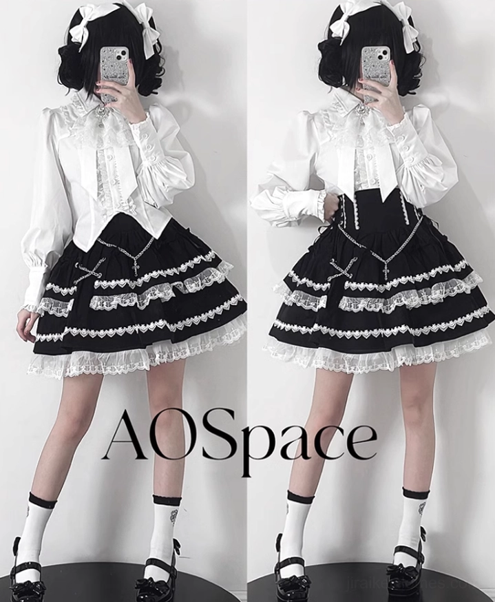 Black and white Jirai Kei blouse skirt set paired with leg warmers thigh highs accessories