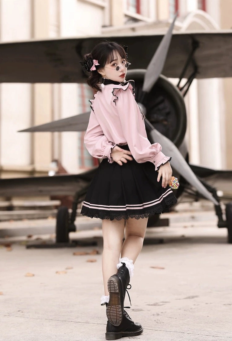 Jirai Kei two-piece set showcasing pleated trumpet sleeves with flying shoulder edges, Chinese embroidery wide collar, and heart-shaped button details