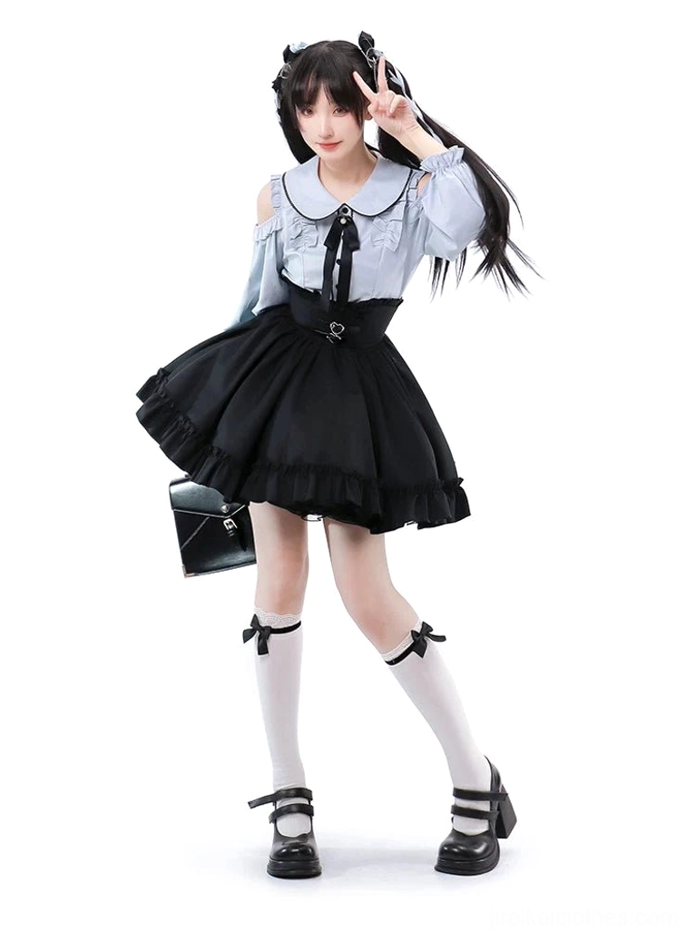 Celestial blue cold-shoulder blouse with voluminous sleeves and Peter Pan collar paired with black multi-layer ruffled skirt, complete Jirai Kei gothic lolita two-piece ensemble on twin-tailed model in studio setting