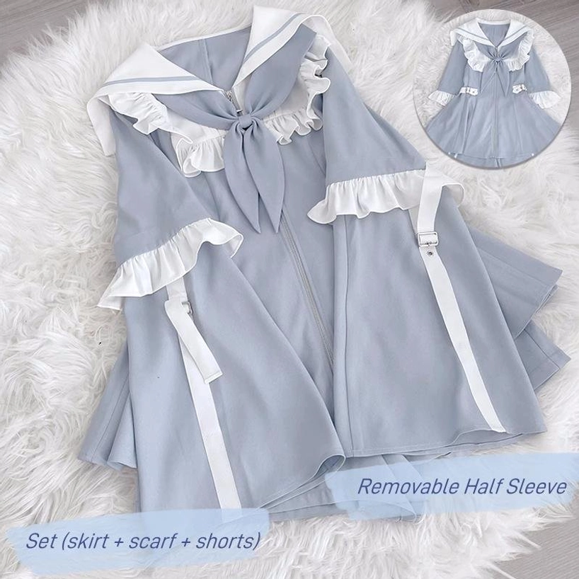 Front pose of model in light blue sailor Jirai Kei two-piece set showcasing front bow, ruffled collar, and proportionate fit of coordinated dress and shorts