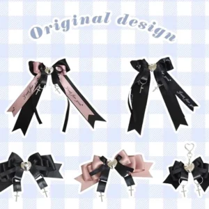 Assorted Jirai Kei style bow hair clips on checkered background overhead view black pink ribbon style duckbill clips with original design marking