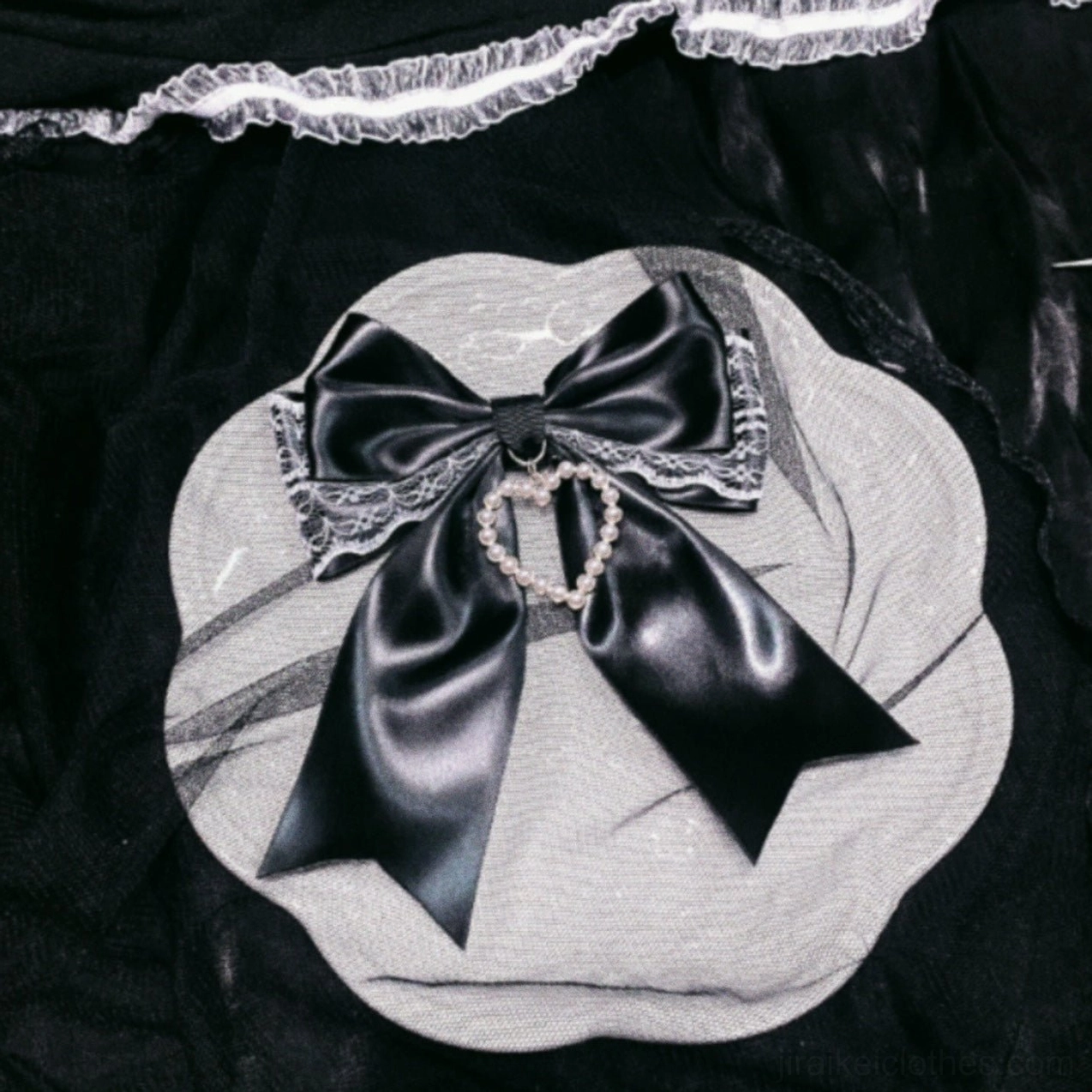 Black satin Jirai Kei bow hair clip accessory with pearl heart frame and delicate white lace edge trim styling