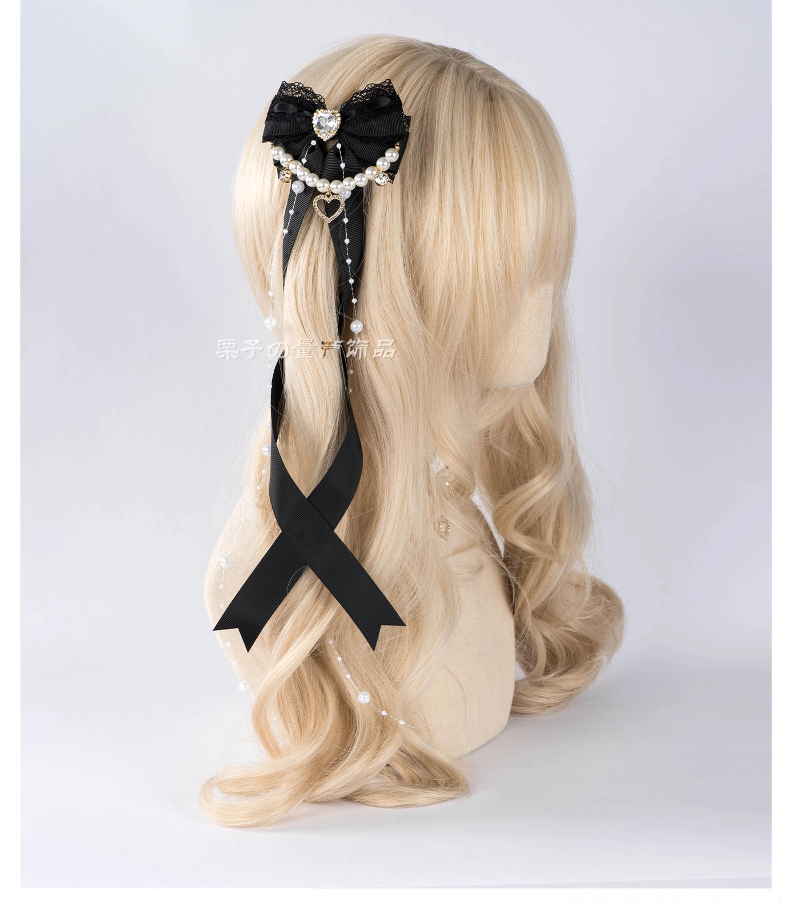Jirai Kei bow hair clip detail photography highlighting lace trim edge work and pearl chain component assembly