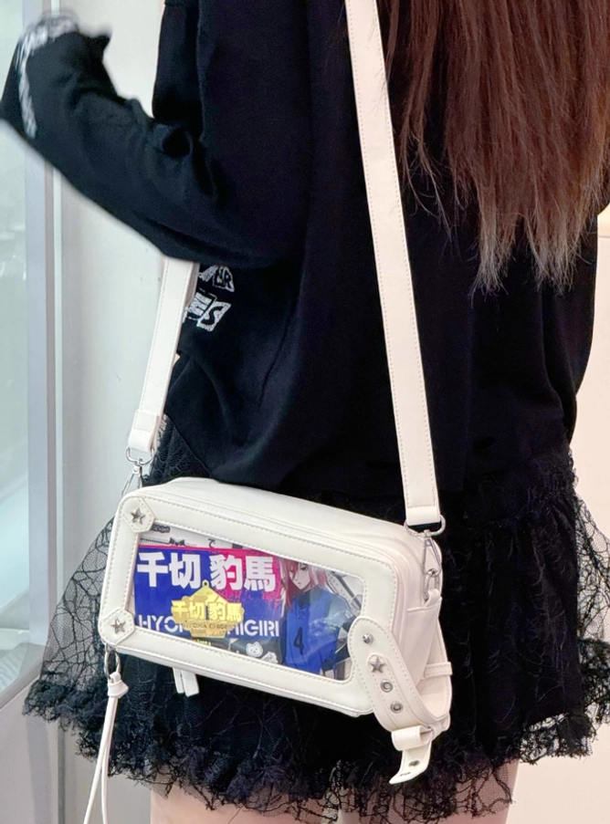 Jirai kei brick itabag crossbody with chinese anime print paired with black lace skirt upper body outfit view