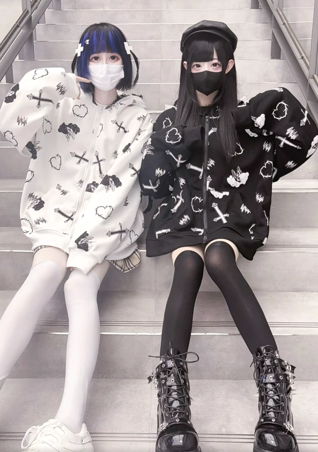Jirai Kei bunny ear hoodie coat worn on indoor stairs, displaying lace-trimmed hood, cute goth outfit styling, and oversized relaxed silhouette