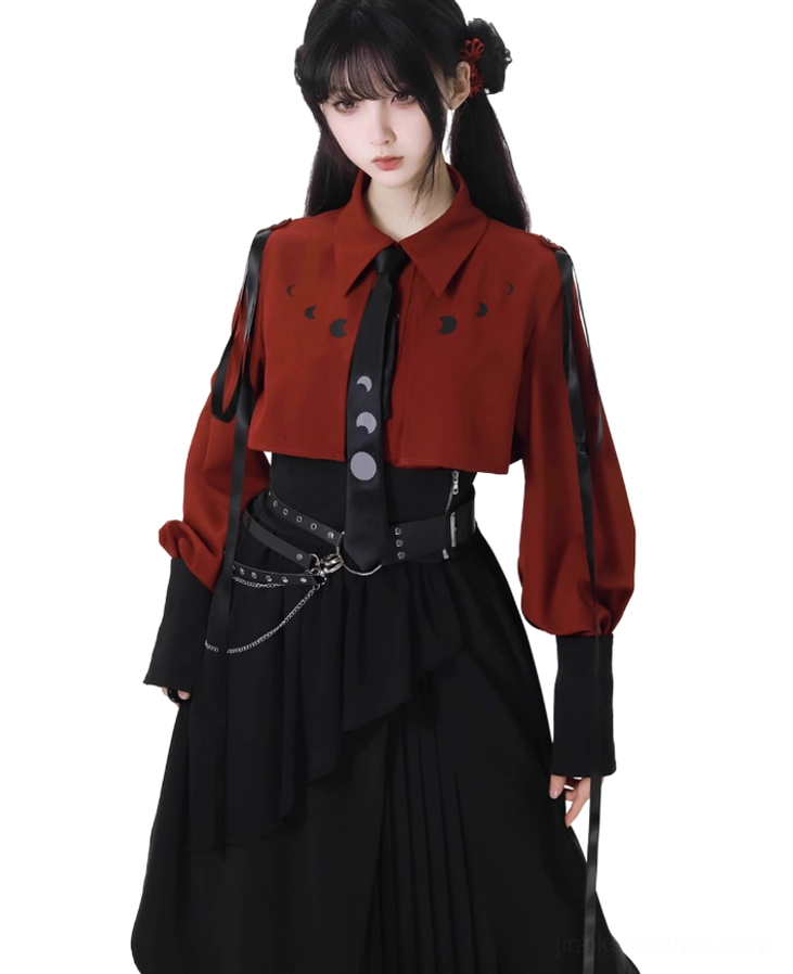 Three-quarter front view of Jirai Kei set in burgundy cropped blouse with moon print paired with mid-length black pleated skirt, showcasing gothic romantic aesthetic