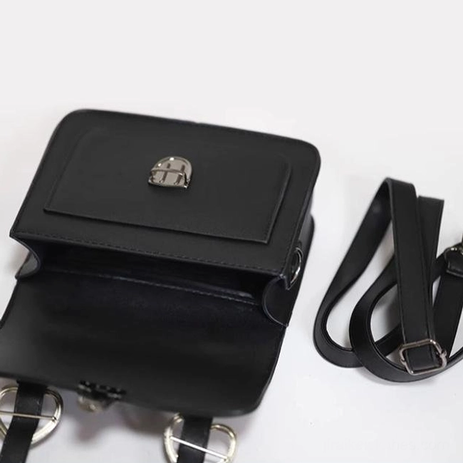Interior compartment view of black Jirai Kei Cambridge handbag showing spacious storage capacity and organizational structure for daily essentials