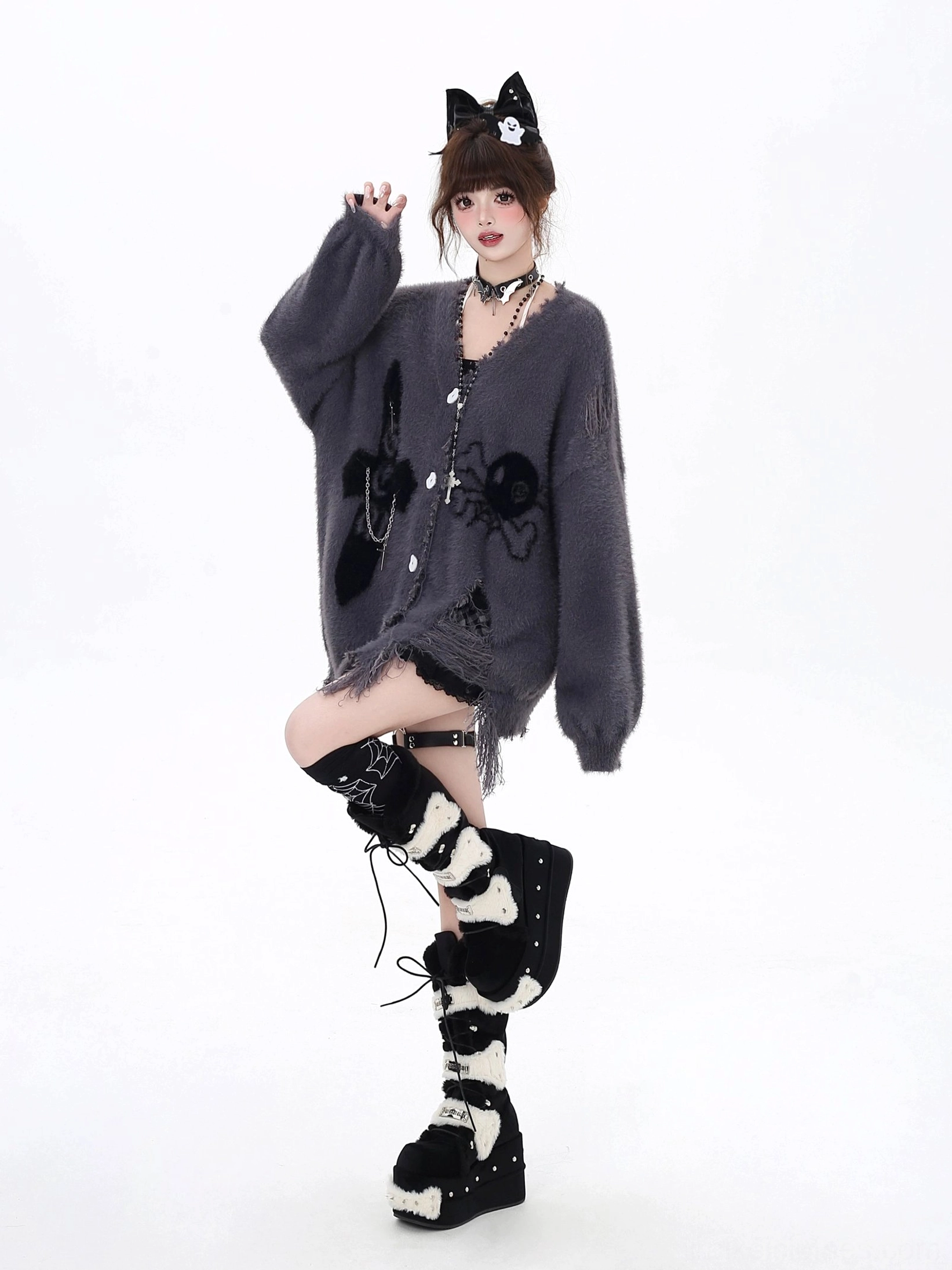 Coordinated striped scarf accessory included with Jirai Kei cardigan set, showing black-white and color-matched pattern coordination with cardigan colorways