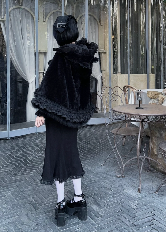 Detailed close-up of cat ear hood design on jirai kei fleece cape coat showing ruffle trim and plush texture construction