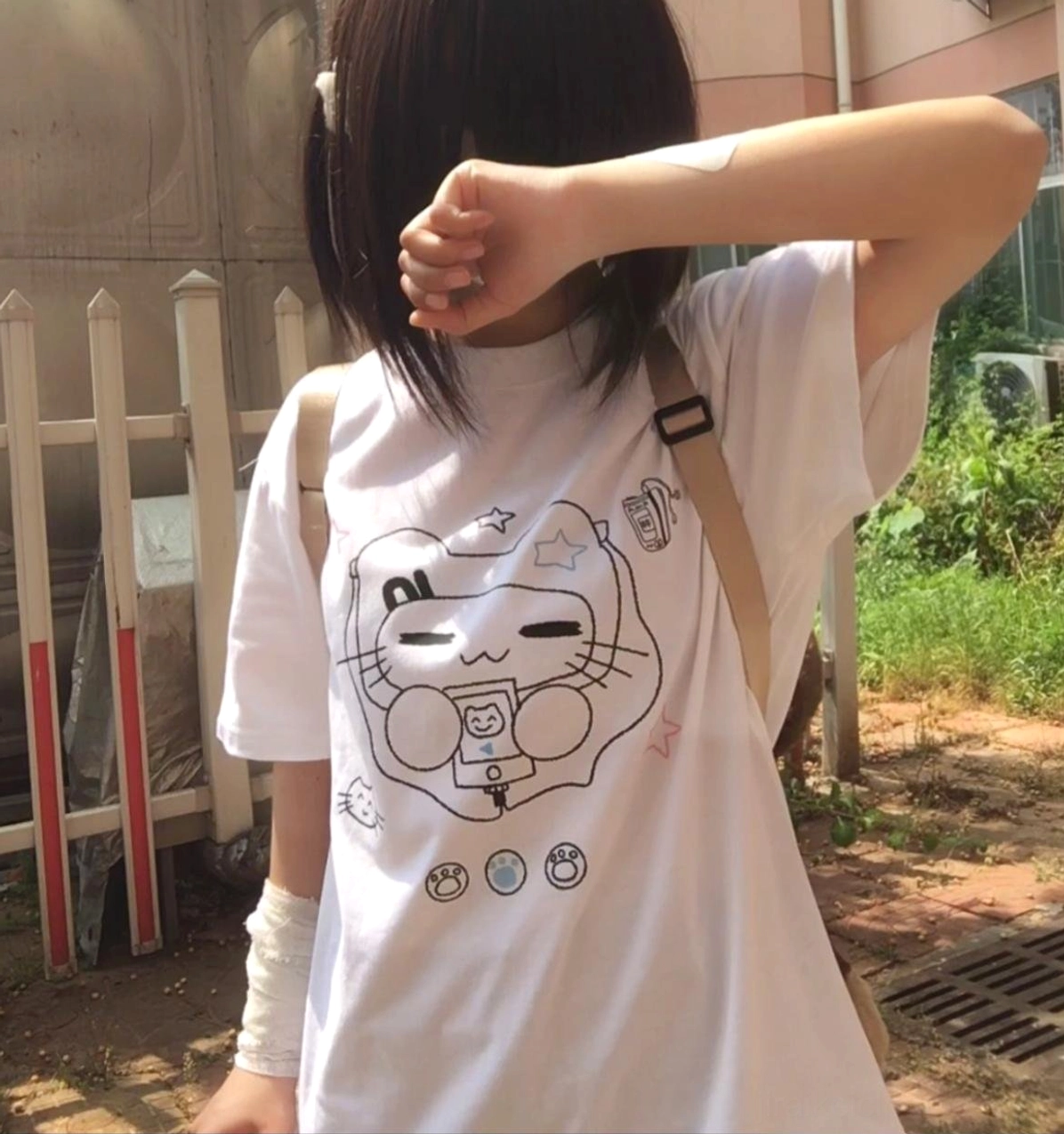Navy and white Jirai Kei cat headset graphic cotton T-shirt flat lay showing garment construction and print placement