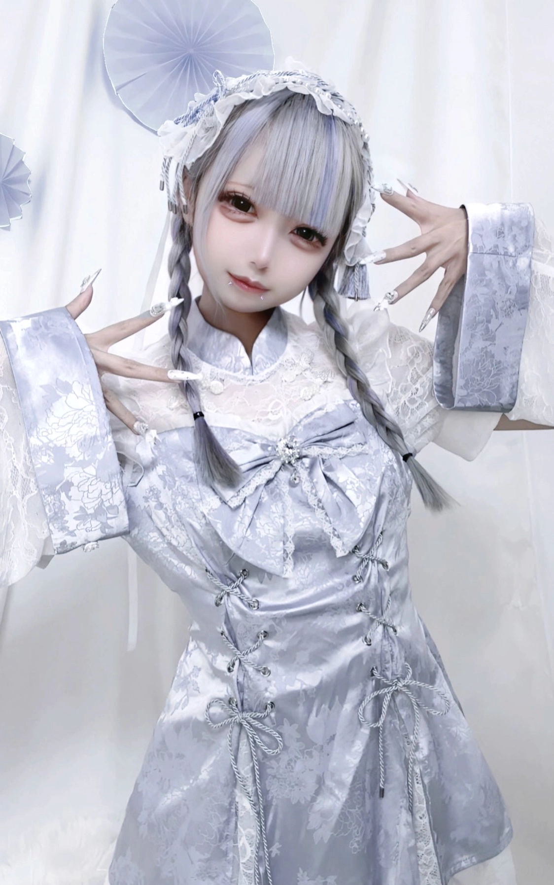 Jirai Kei Chinese lace mini dress with silver-blue fabric front chest view showing cross-laced corset bodice and decorative butterfly bow