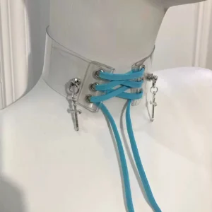 Transparent PU cross choker necklace featuring blue adjustable straps and metallic cross pendants, angled perspective on mannequin display