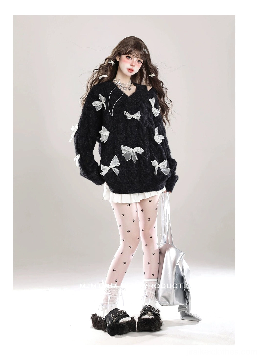 Jirai Kei cold-shoulder sweater with fuzzy knit texture and white ribbon bows, V-neck design detail view, paired with pleated skirt for complete outfit reference