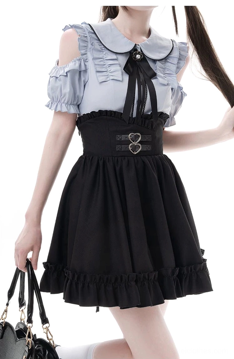 Complete Jirai Kei set featuring long-sleeve cold-shoulder blouse in light blue paired with black multi-layer ruffled skirt on full-length display model