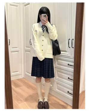 Jirai Kei cream white V-neck cardigan front view mirror selfie with Kansai collar sailor uniform indoor bedroom styling