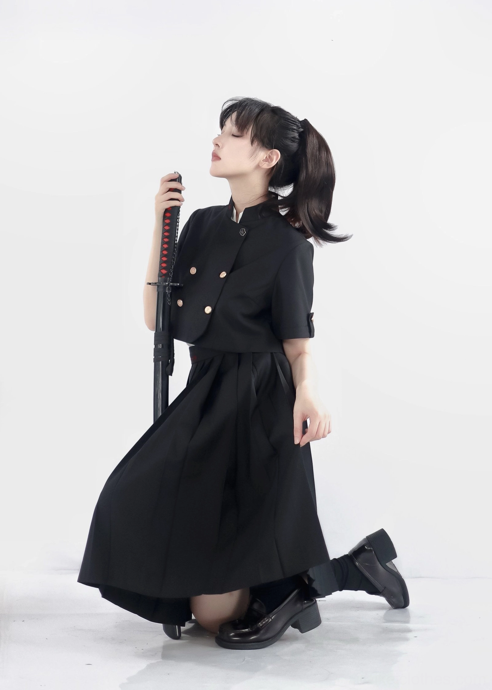 Jirai Kei cropped coat stand-up collar black fabric golden button detail front view flat lay