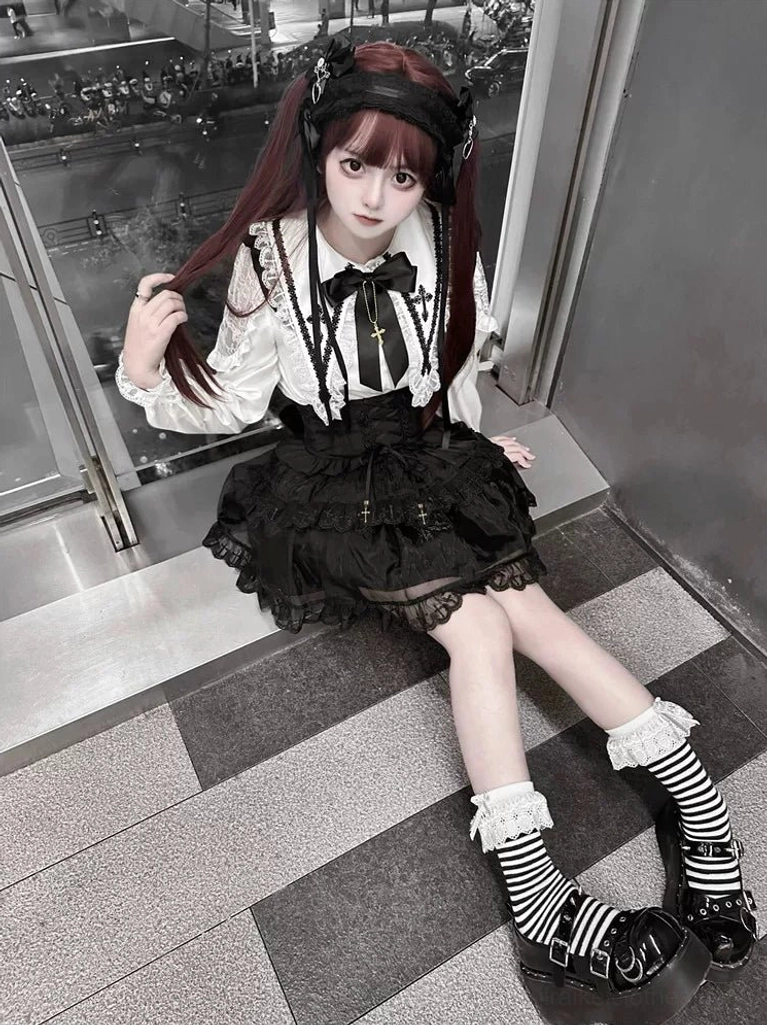 Jirai Kei cross pendant flutter sleeve blouse and black suspender skirt set styling inspiration fashion photoshoot detail