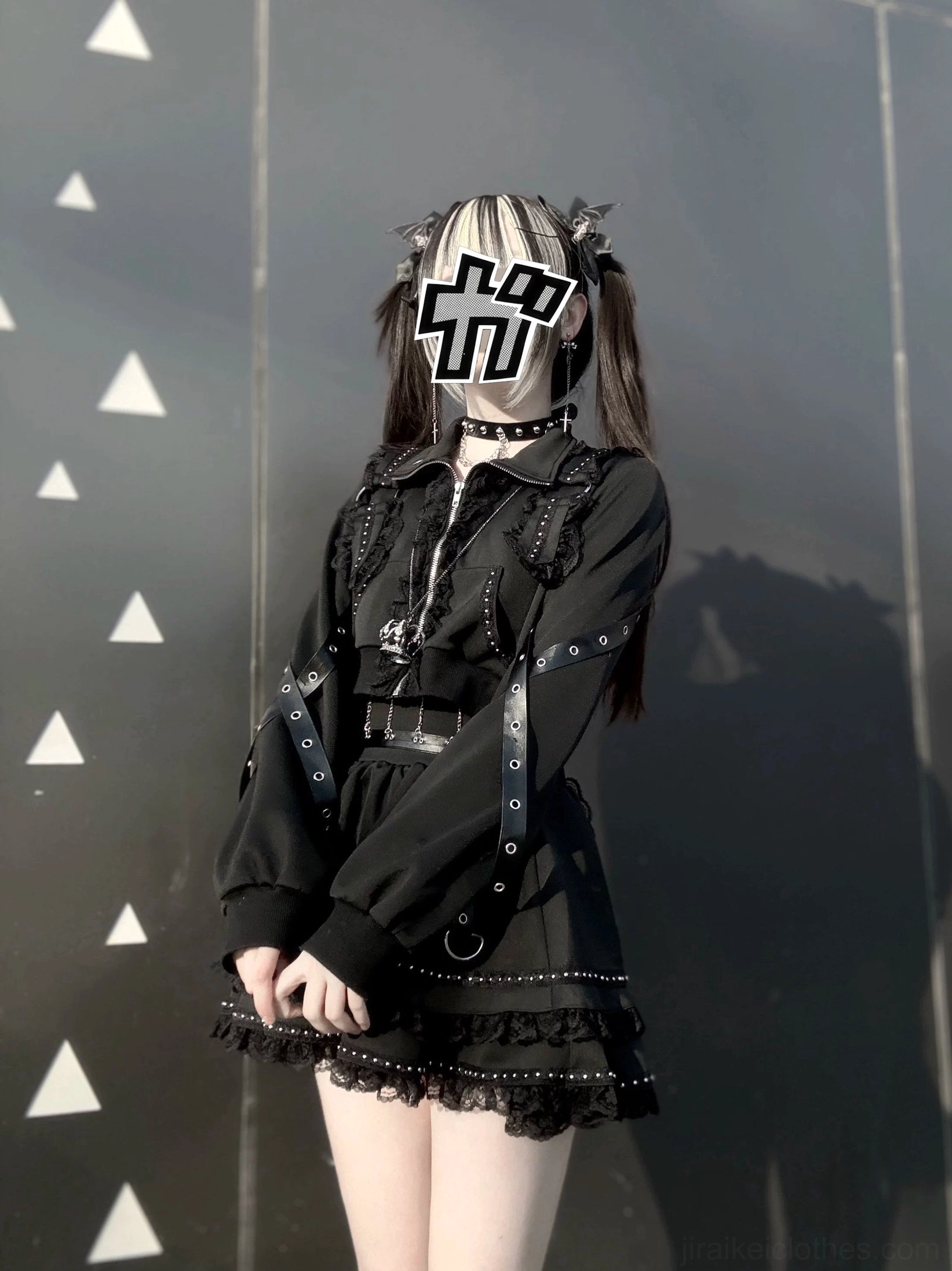 Jirai Kei dark aesthetic jacket skirt front three-quarter view slim long sleeves buckle straps lace ruffle hem studded details model