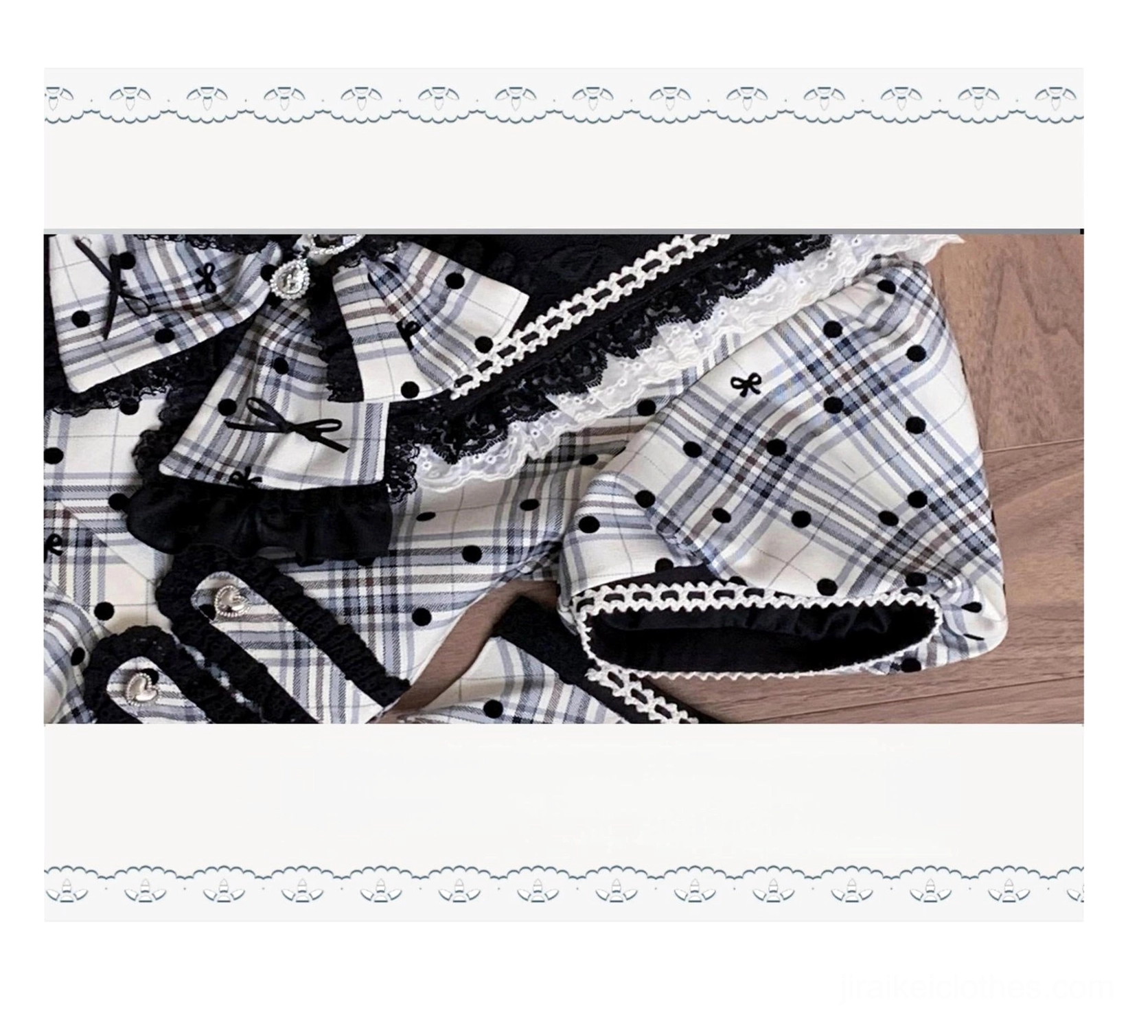 Close-up flat lay detail of Jirai Kei dress lace-trimmed oversized bow with ruffled trim and flocked bow accents on plaid fabric base