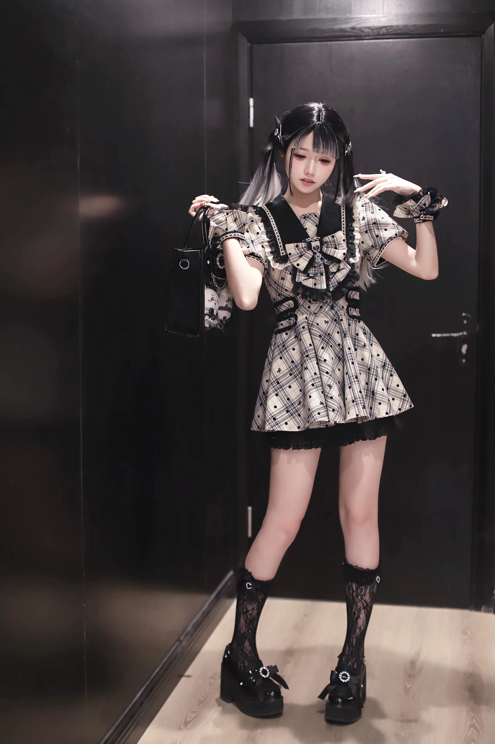 Ruffled black hem detail of Jirai Kei lolita dress showing multi-layered frill construction and quality lace edging