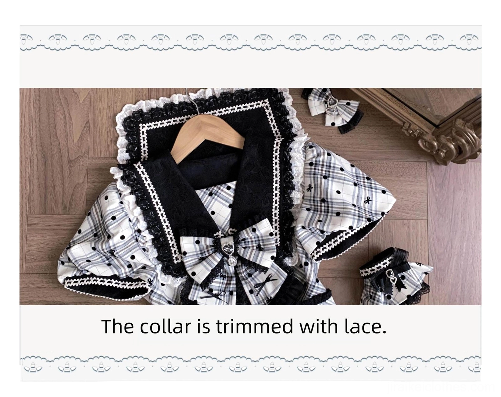 Close-up flat lay detail of Jirai Kei dress sailor collar and oversized front bow with lace trim on wooden background