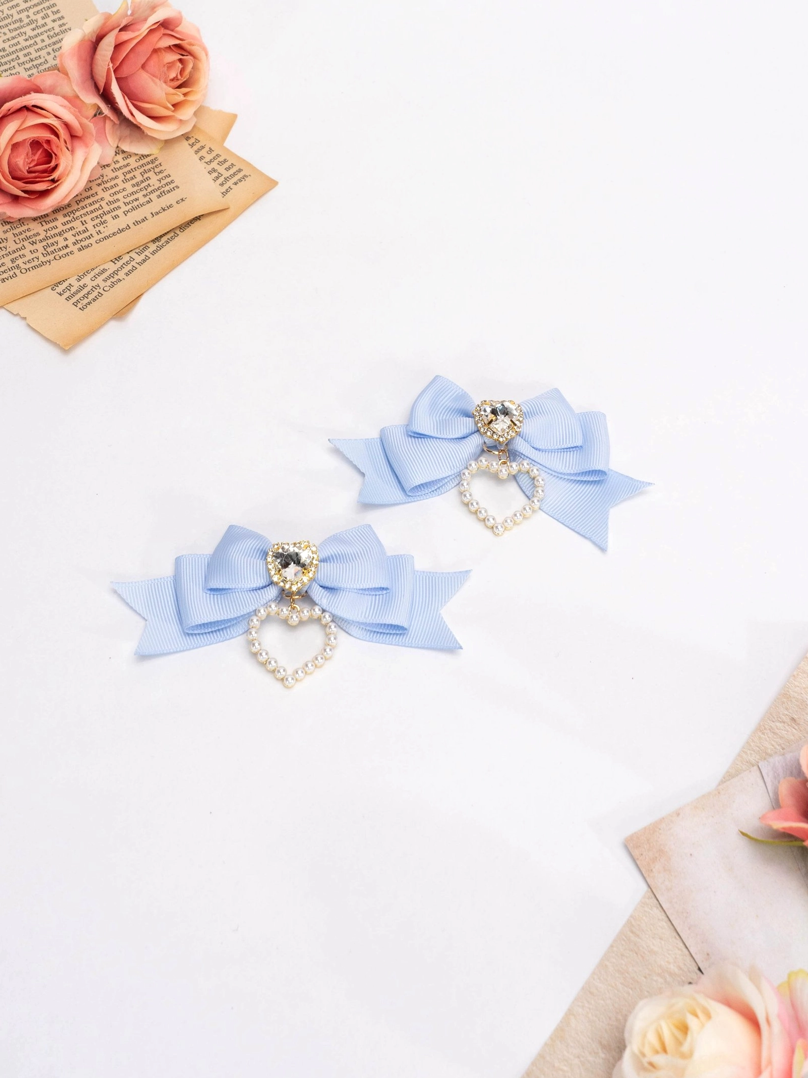 Dusty blue Jirai Kei lolita bow hair clips with rhinestone center and pearl heart pendant kawaii style