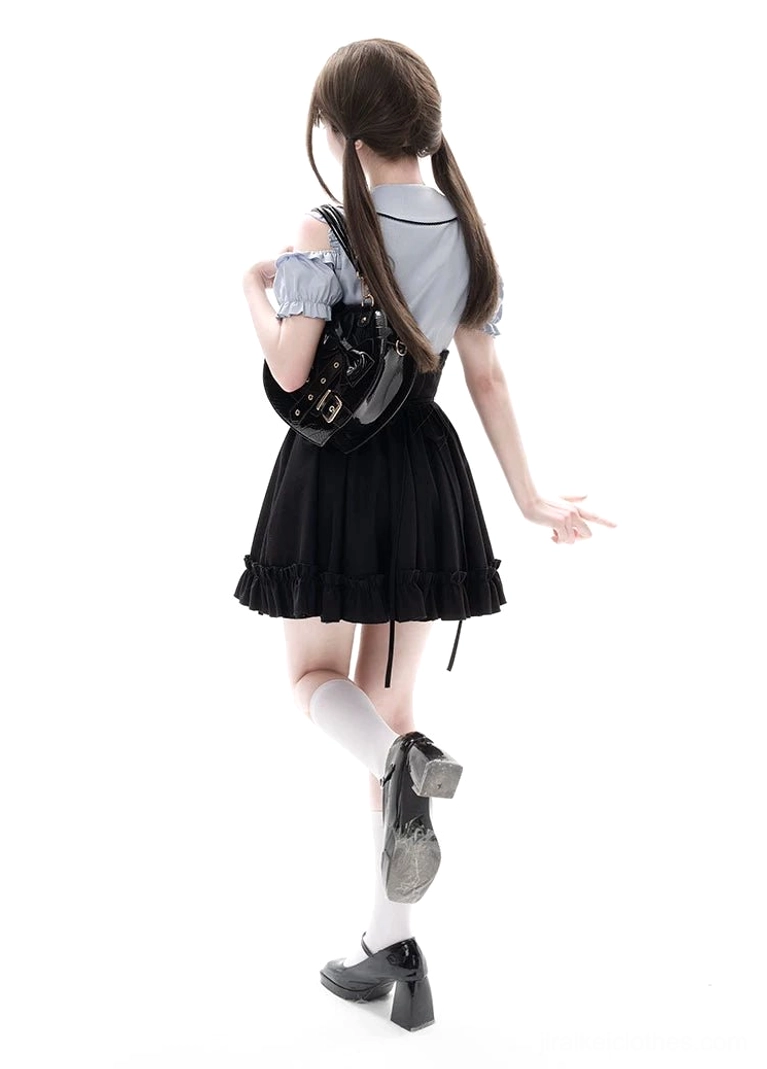 Three-quarter dynamic pose featuring Jirai Kei two-piece outfit in light blue cold-shoulder blouse and black multi-layer ruffled skirt with movement and silhouette emphasis