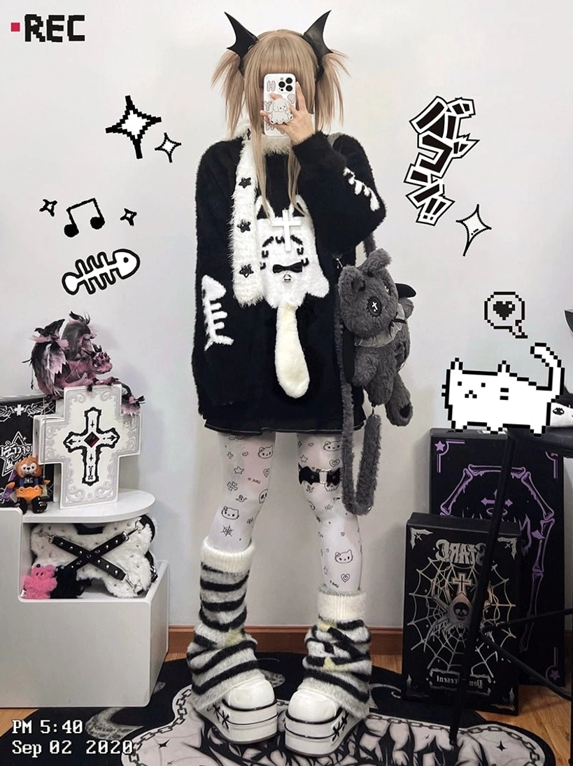 Cross necklace accessory included with Jirai Kei ghost cat couple sweater spiritual rebellious symbol detail