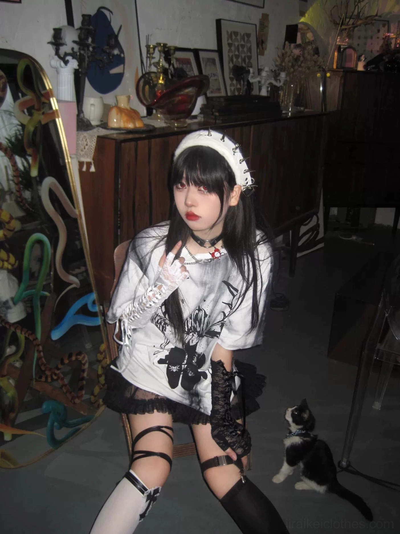 Three-quarter view of oversized tie-dye gothic jirai kei angel t-shirt showing silhouette and print coverage on unisex fit