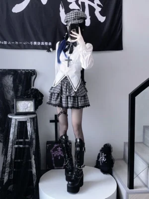 Full body Jirai Kei gothic outfit complete ensemble front view, white blouse with detachable black bow tie, plaid tiered ruffled skirt, platform boots, gothic accessories, indoor studio