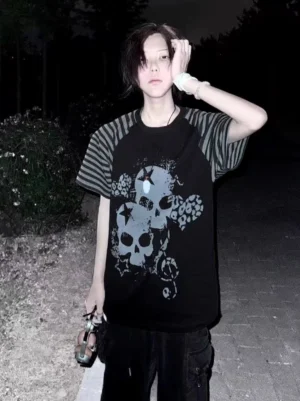 Black jirai kei gothic skull raglan t-shirt outdoor night styling with handbag accessory streetwear aesthetic
