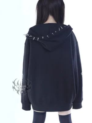 Oversized gothic Jirai Kei hoodie jacket back view, showing spiked hood edge trims, loose black fabric drape, and back design details