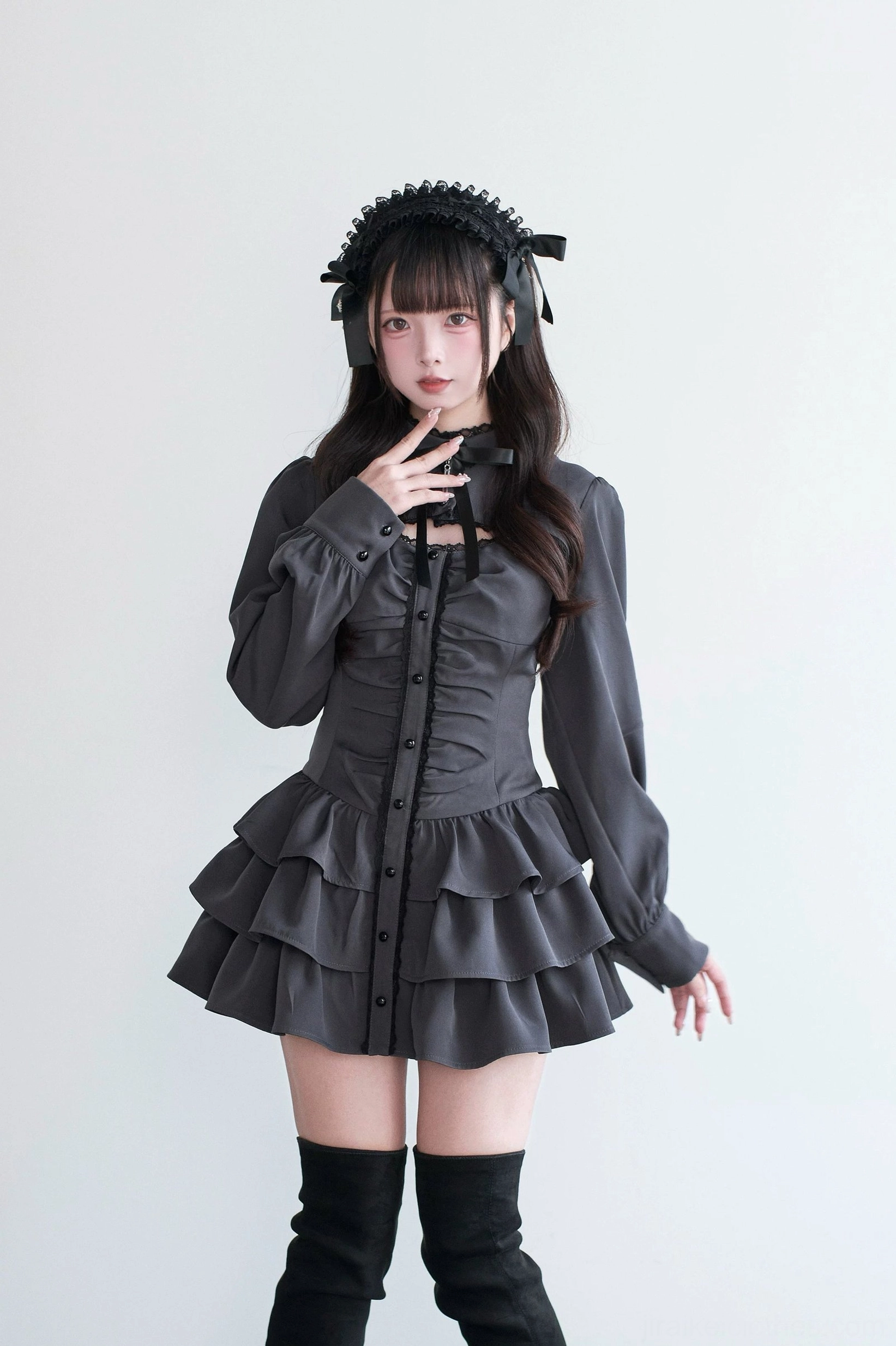 Gray Jirai Kei gothic dress front close-up with hand on chest cutout and ruched front design detail