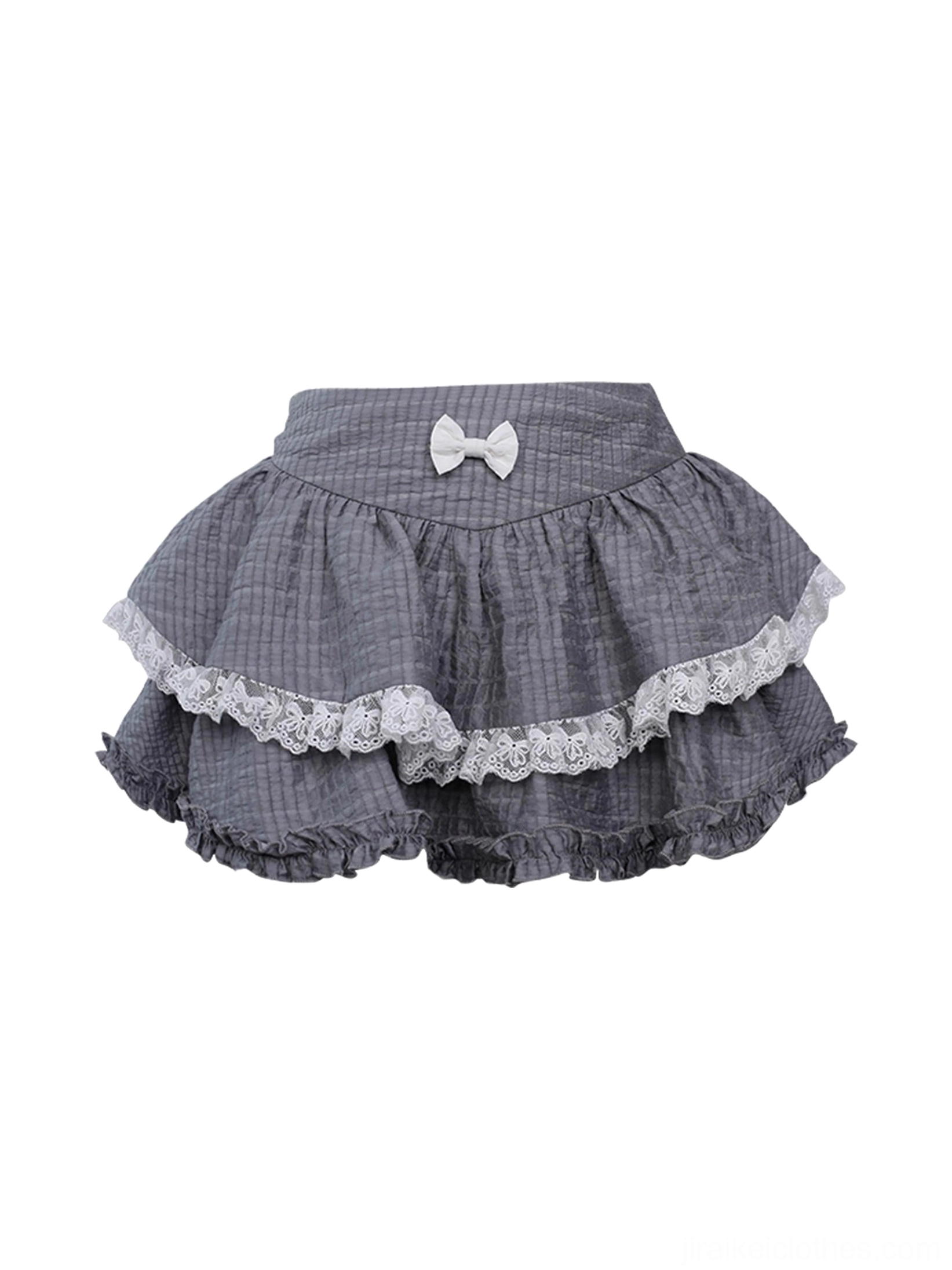 Top-down flat lay view of gray ruffled plaid mini skirt displaying double-layered fabric construction, white lace trim details, small waist bow accent, and built-in safety shorts