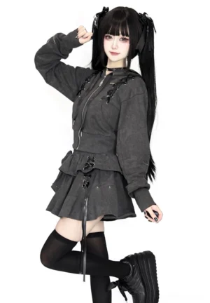 Gray tie-dye Jirai Kei subculture hoodie and pleated skirt ensemble three-quarter angle view with lace-up hood and high-waisted fit