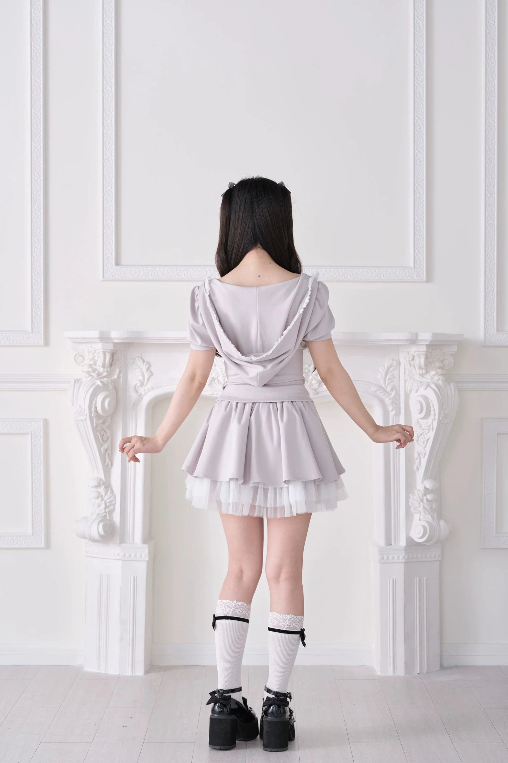 Gray Jirai Kei two-piece set back view showing hooded design and ruffled tulle hem layering with platform loafers