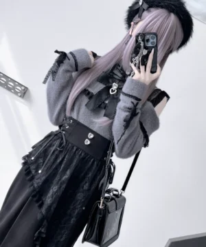 Grey cold-shoulder fuzzy knit top with black lace detail and heart-shaped buckle accessory Jirai Kei aesthetic mid-body mirror view