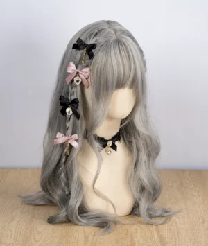 Jirai Kei bow hair clips featuring mixed black pink and brown satin bows with rhinestone and cutlery pendants on mannequin with gray wavy wig and lace choker
