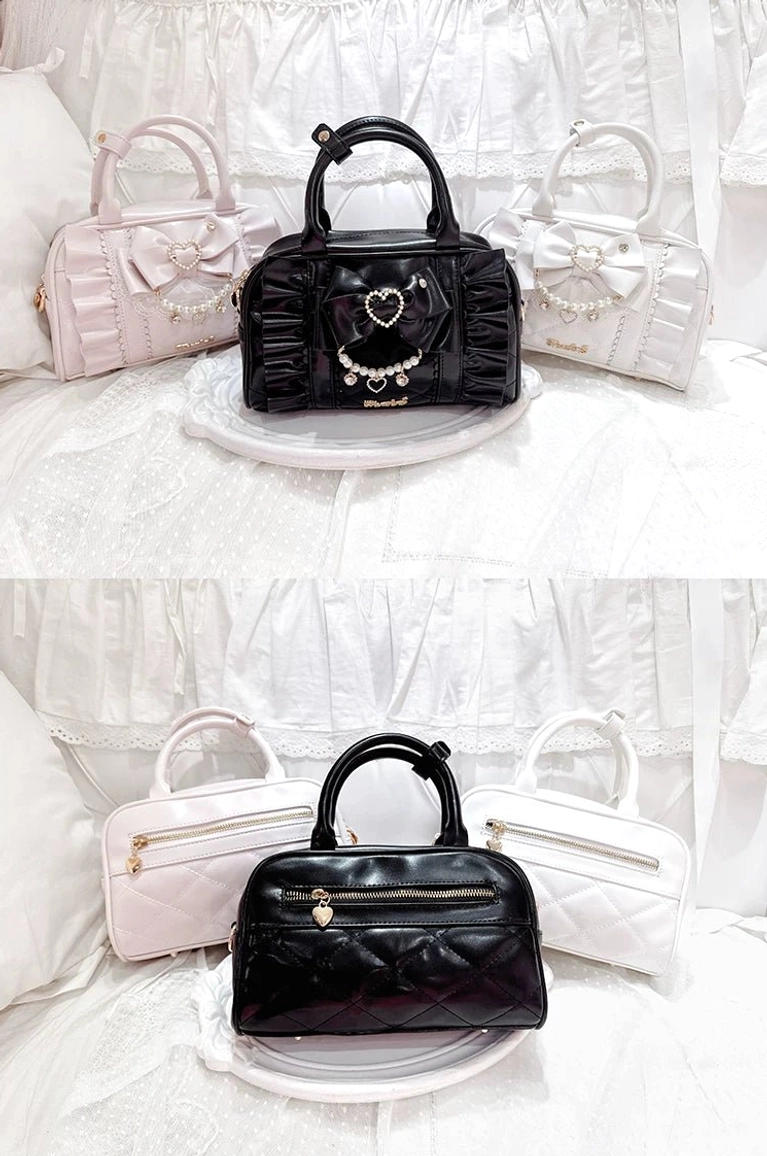 Complete Jirai Kei handbag collection showing all three color variants pink black and cream white displayed together on stands with lace backdrop