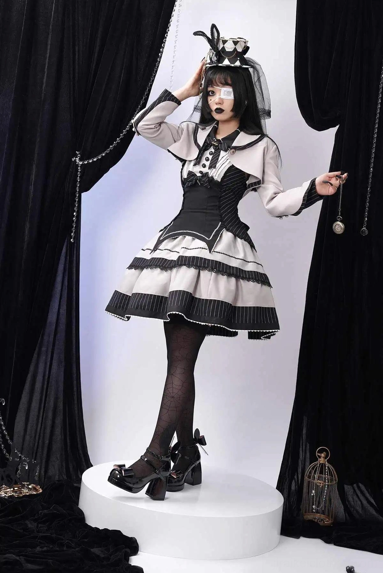 Jirai Kei platform heels showing detachable bunny ear bow decoration at heel and ankle strap construction from side angle