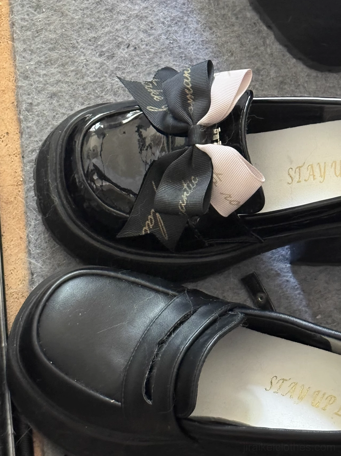 Detachable black and light pink dual-tone ribbon bow accessory for Jirai Kei platform heels, flat lay top-down view with gold printed text detail