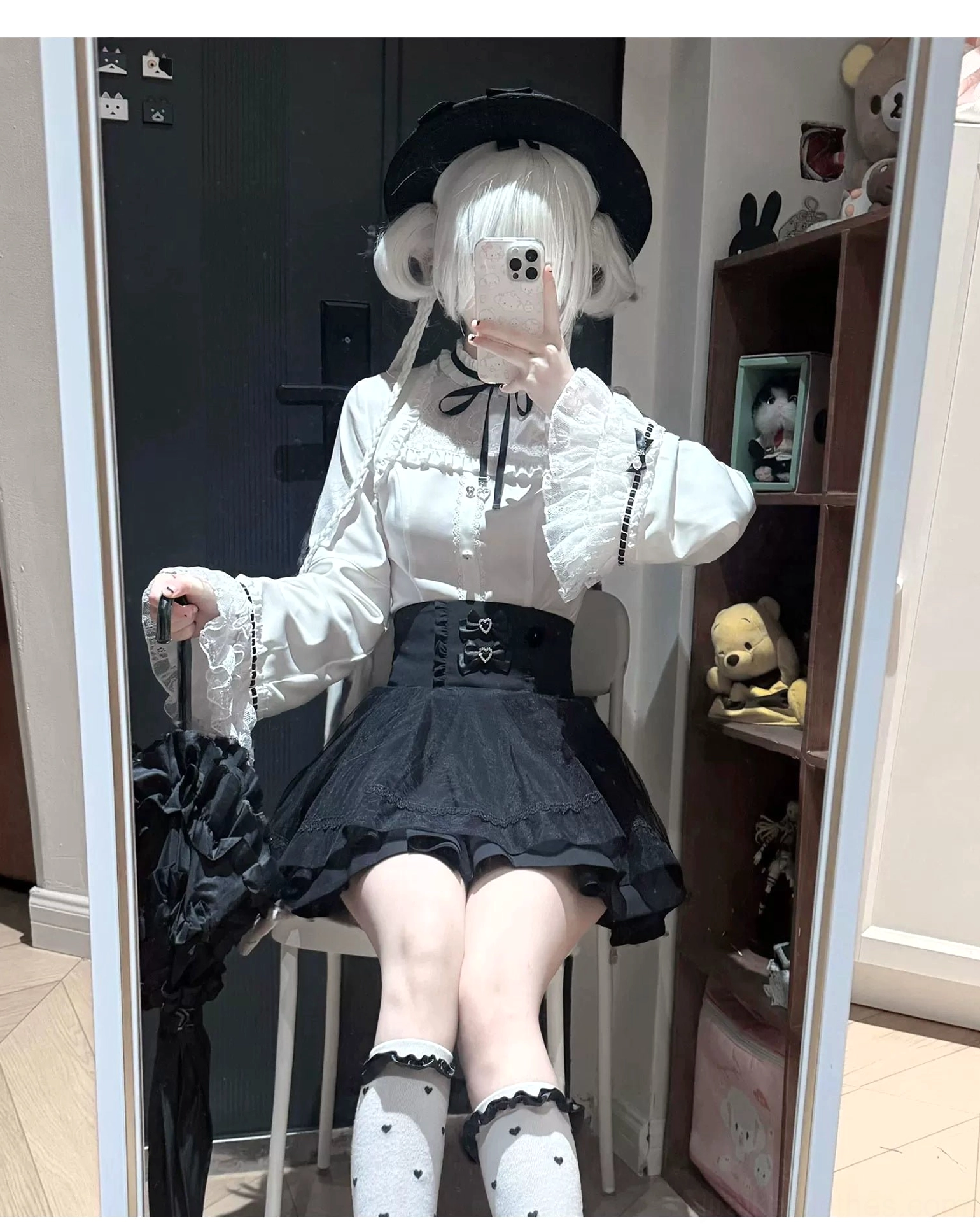 High-waist a-line jirai kei skirt with double heart-shaped rhinestone buckles and layered double-layer chiffon construction, showing flattering silhouette and romantic aesthetic